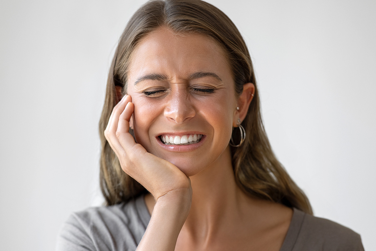 Headshot Happy Aged Female Laughing Posing On Grey Studio Background